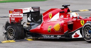 vettel-gp-belgio-f1-gomma-posteriore-distrutta